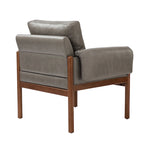 Comoda poltrona da salotto lucida con base in legno massello