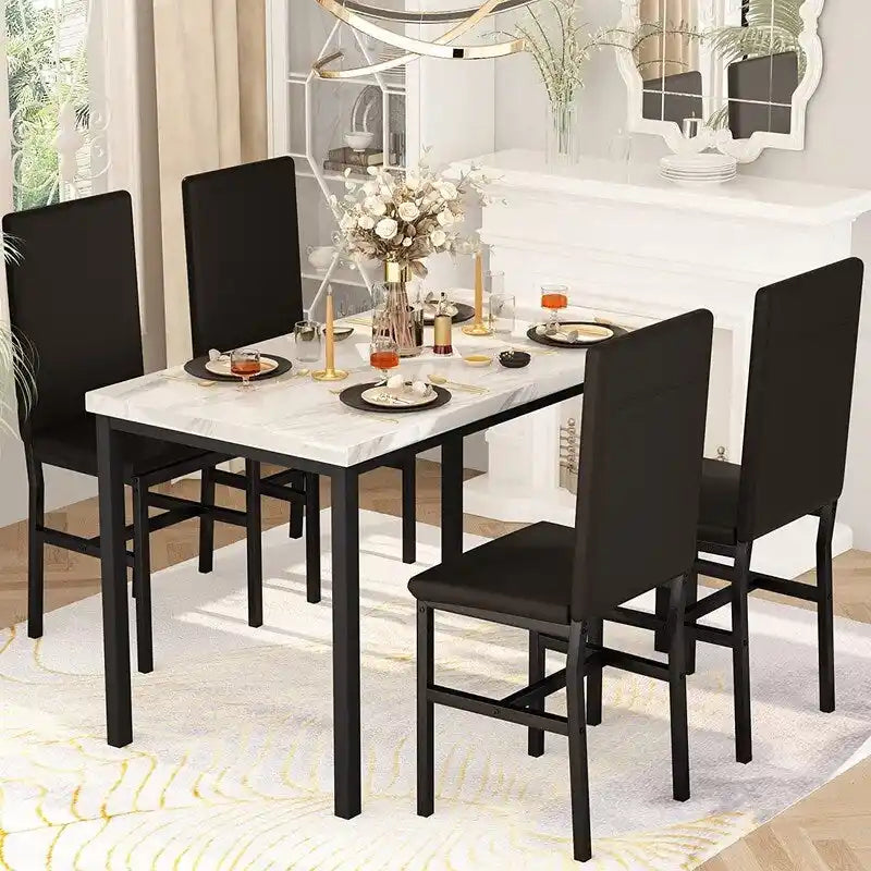Set da pranzo Mieres 5 pezzi con tavolo in finto marmo e 4 sedie imbottite in pelle sintetica PU