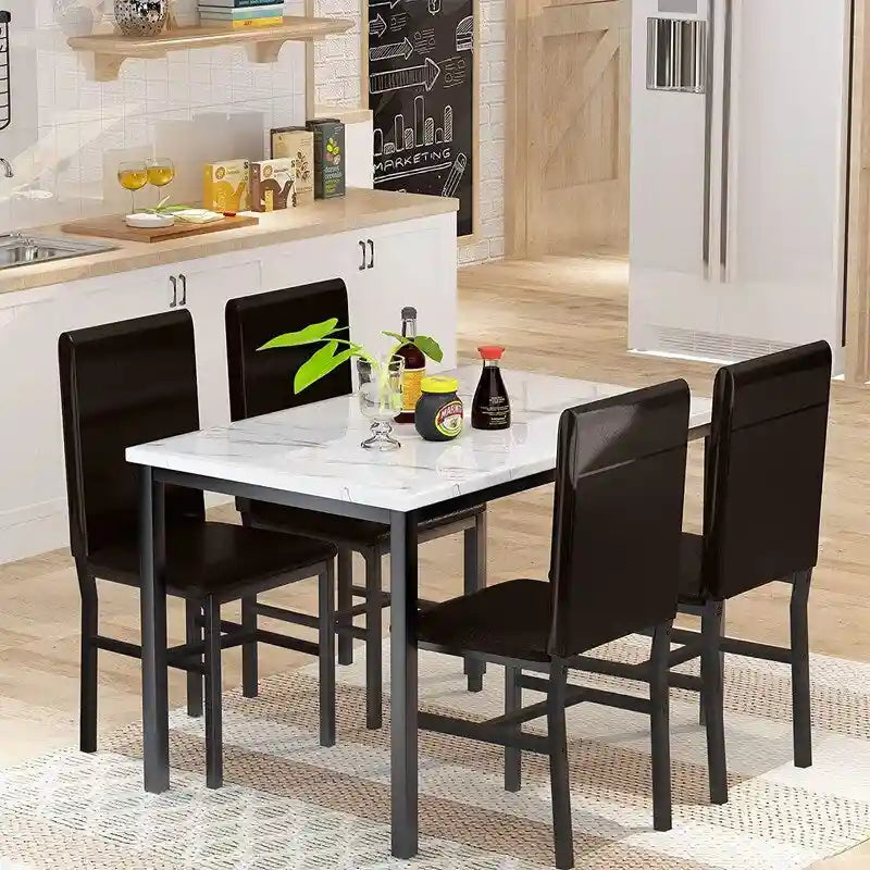 Set da pranzo Mieres 5 pezzi con tavolo in finto marmo e 4 sedie imbottite in pelle sintetica PU