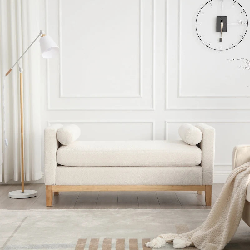 Elegante panca imbottita, con gambe in legno