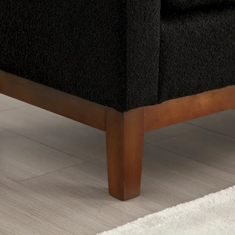 Elegante panca imbottita, con gambe in legno