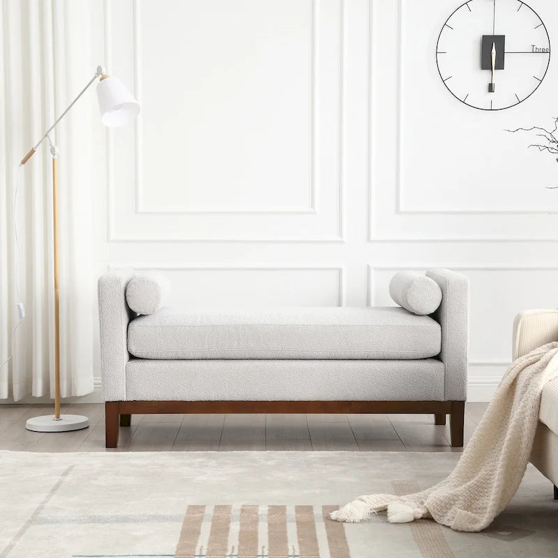 Elegante panca imbottita, con gambe in legno
