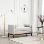 Elegante panca imbottita, con gambe in legno