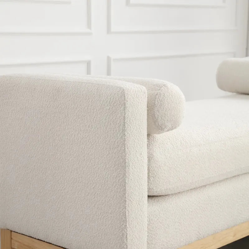 Elegante panca imbottita, con gambe in legno