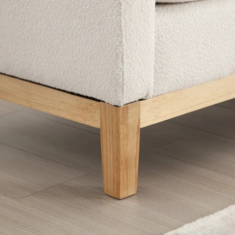 Elegante panca imbottita, con gambe in legno